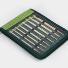 set of Tunisian crochet hooks in green case