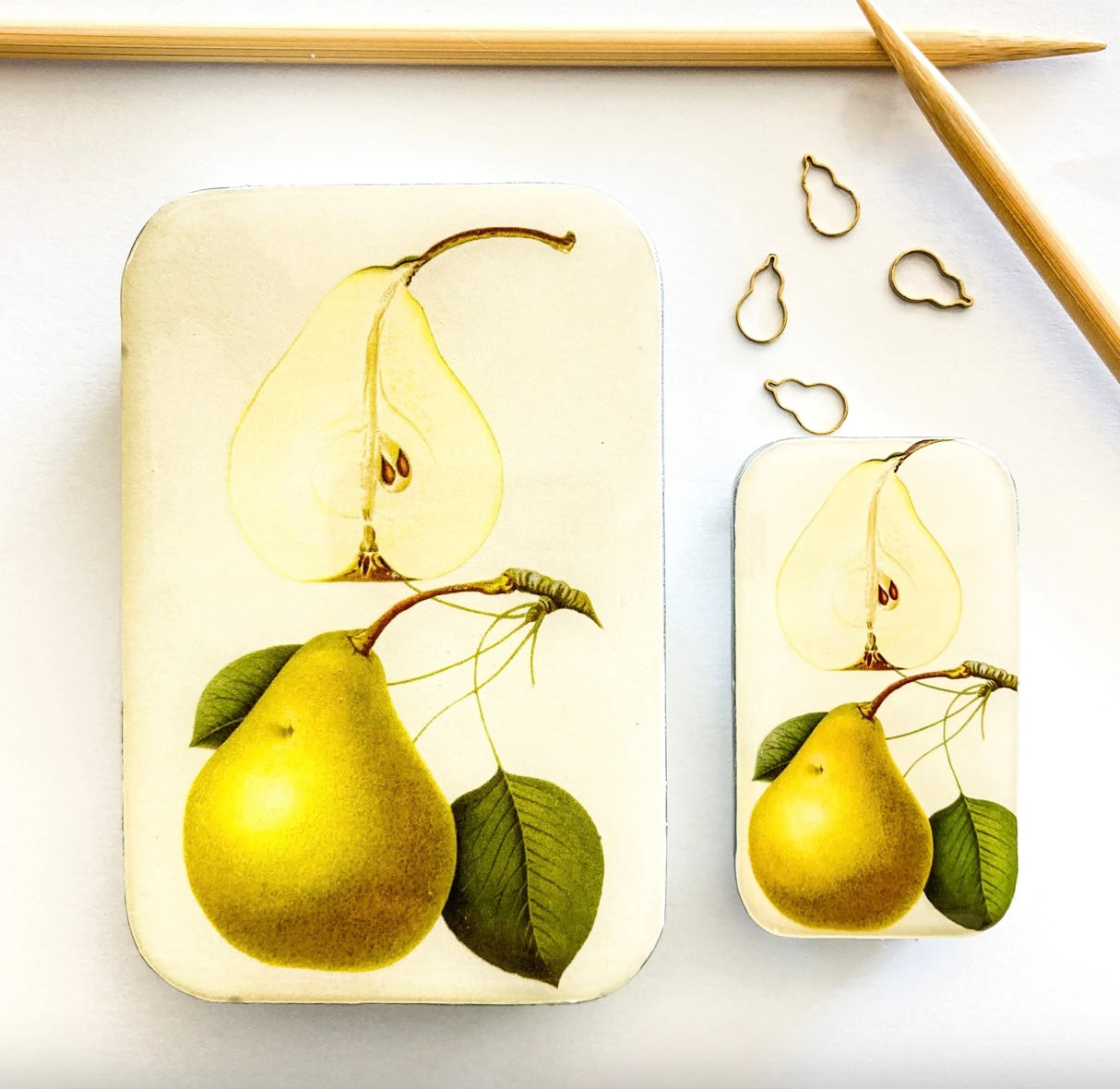 metal tin with pear artwork