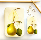 metal tin with pear artwork