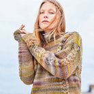 woman wearing cable knit sweater