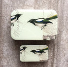 metal tin with magpie artwork