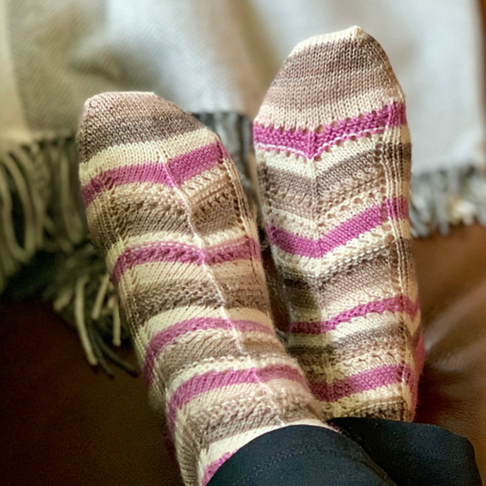 woman wearing hand knit socks
