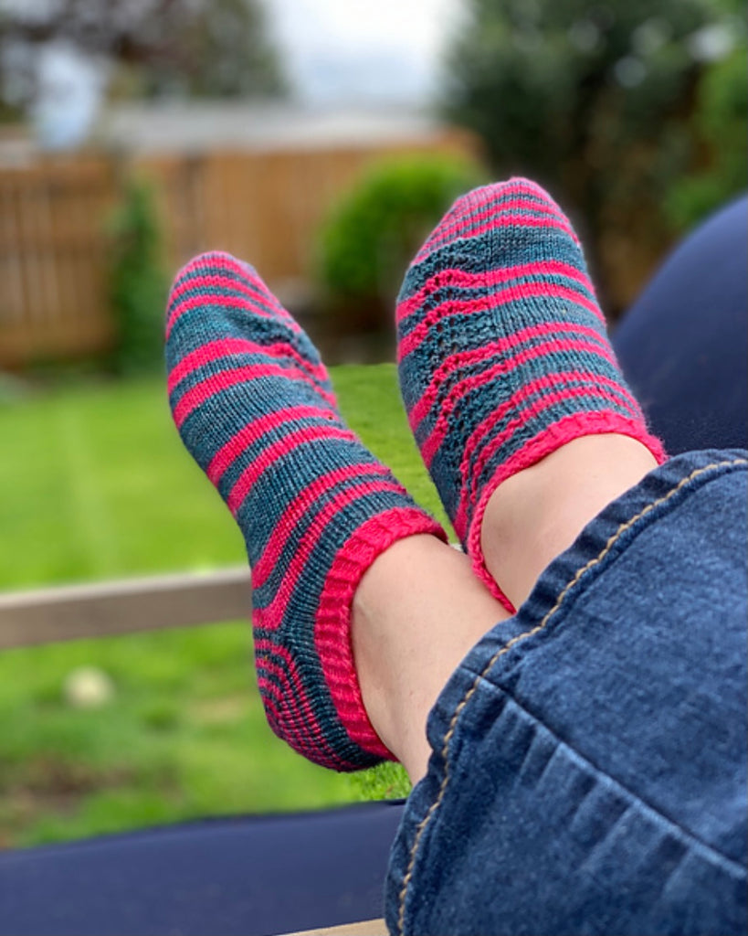 woman wearing hand knit socks