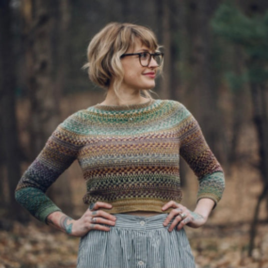 Andrea Mowry wearing a handmade sweater