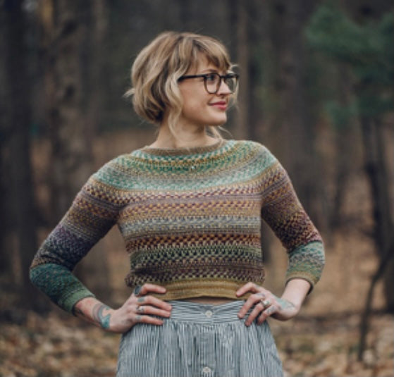 Andrea Mowry wearing a handmade sweater