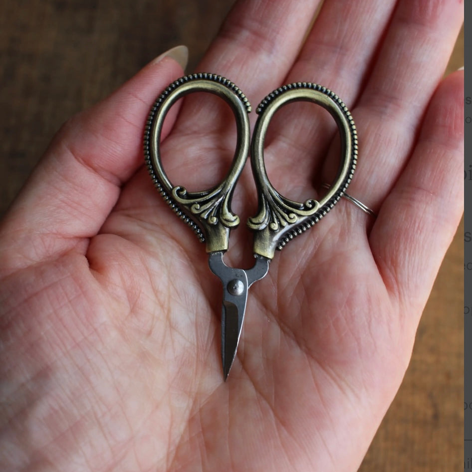 a pair of tiny scissors