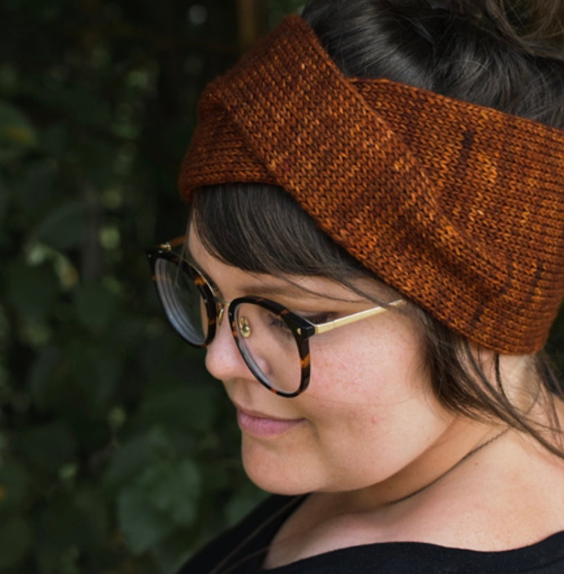 woman wearing knit headband